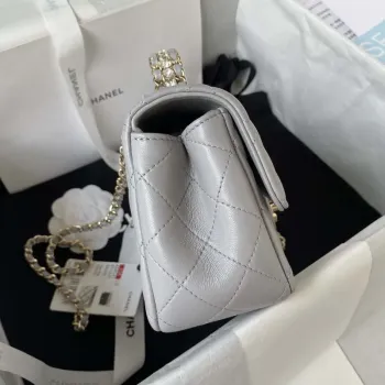 Chanel AS4141 Camellia s reliéfním vzorem a horním uchem, šedá