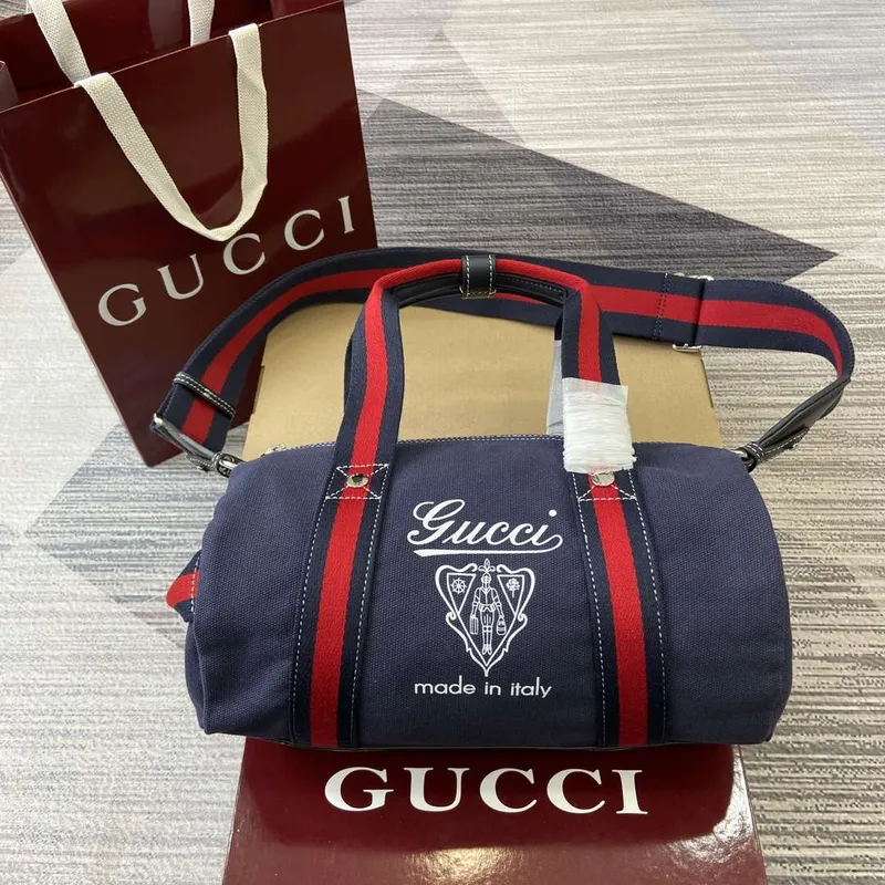 Gucci 816865 Malá tištěná plátěná taška Duffle Tmavě modrá