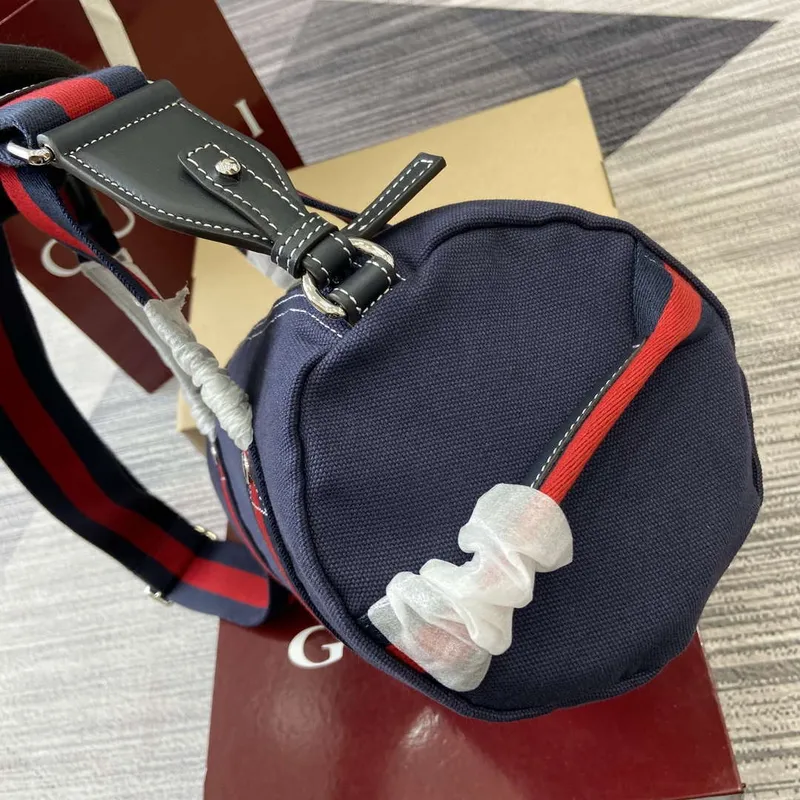 Gucci 816865 Malá tištěná plátěná taška Duffle Tmavě modrá