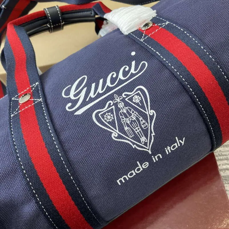 Gucci 816865 Malá tištěná plátěná taška Duffle Tmavě modrá