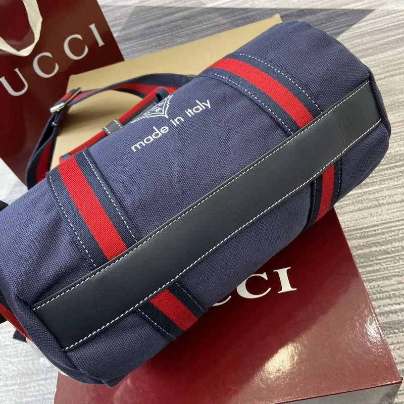 Gucci 816865 Malá tištěná plátěná taška Duffle Tmavě modrá