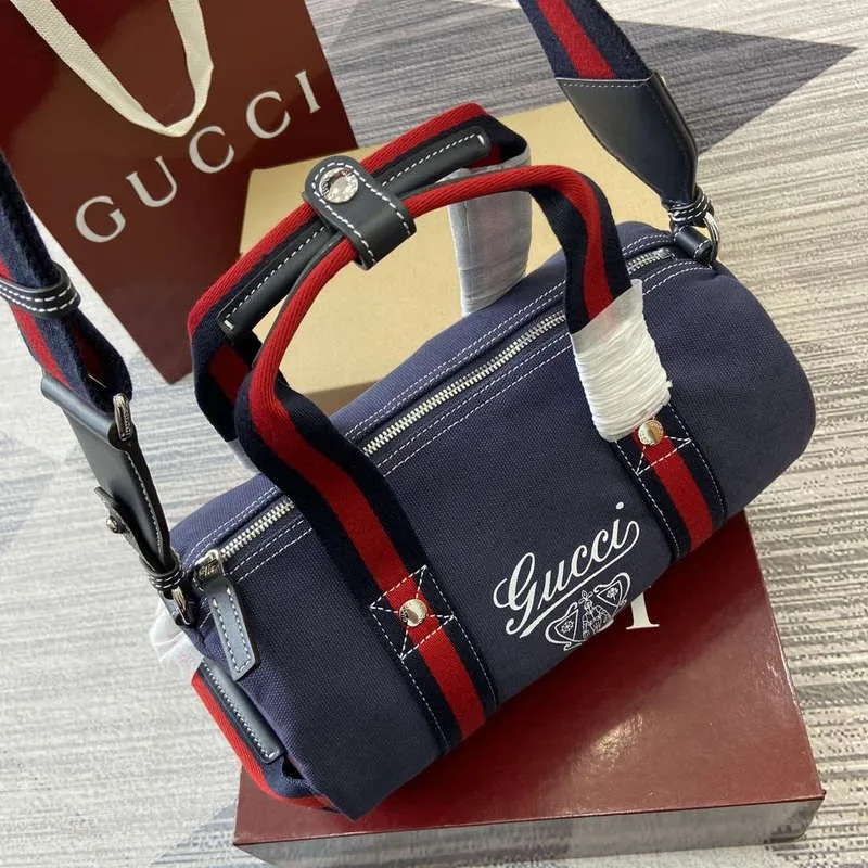 Gucci 816865 Malá tištěná plátěná taška Duffle Tmavě modrá