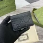 Gucci 815883 GG Emblem pouzdro na karty černá kůže