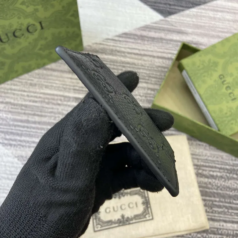 Gucci 815883 GG Emblem pouzdro na karty černá kůže