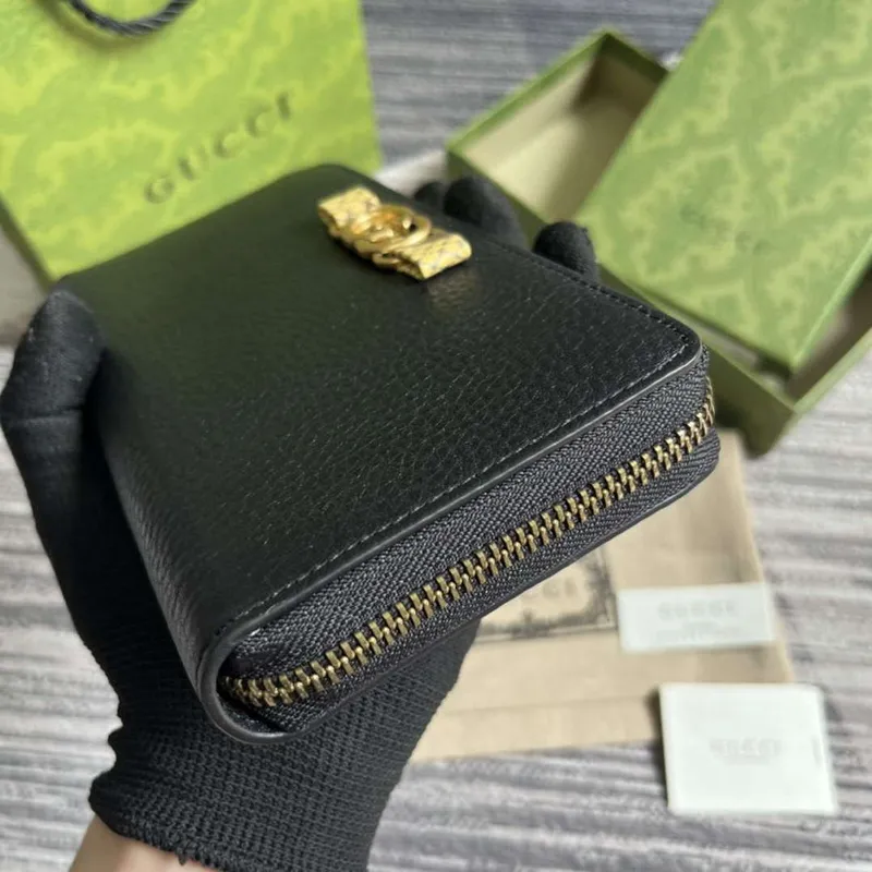 Gucci 750458 Zip peněženka s propleteným G pythonovým mašlí černá