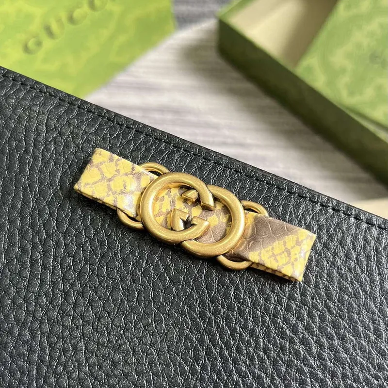 Gucci 750458 Zip peněženka s propleteným G pythonovým mašlí černá