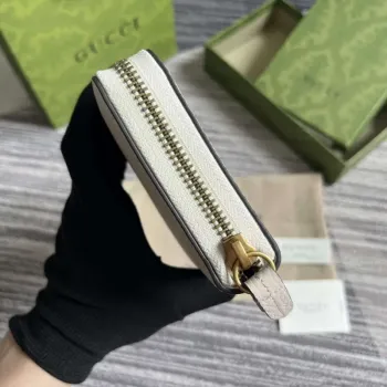 Gucci 750458 zipová peněženka s propletenou G pythonovou mašlí bílá