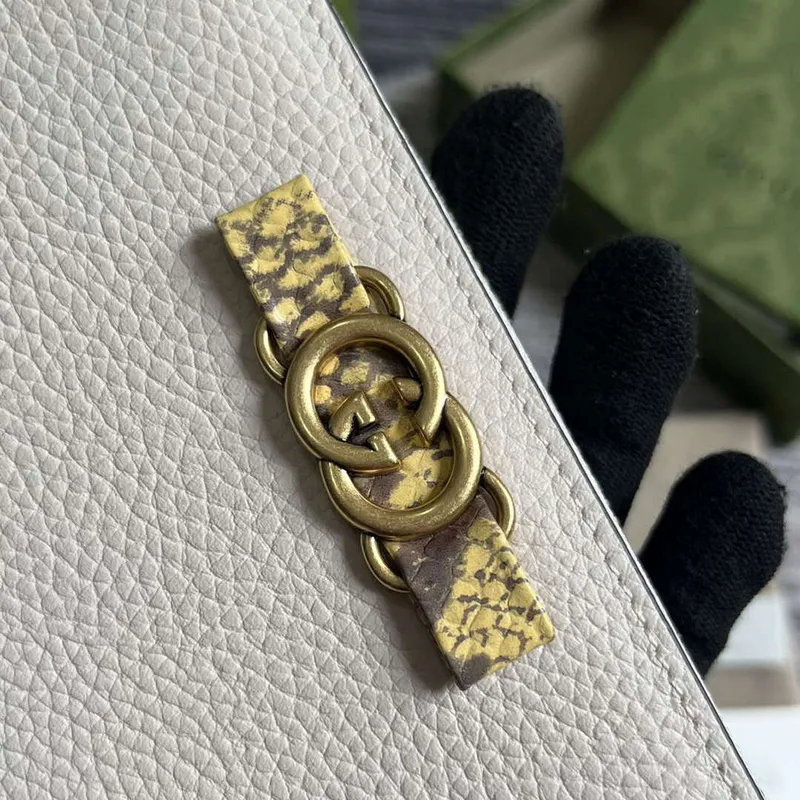 Gucci 750458 zipová peněženka s propletenou G pythonovou mašlí bílá