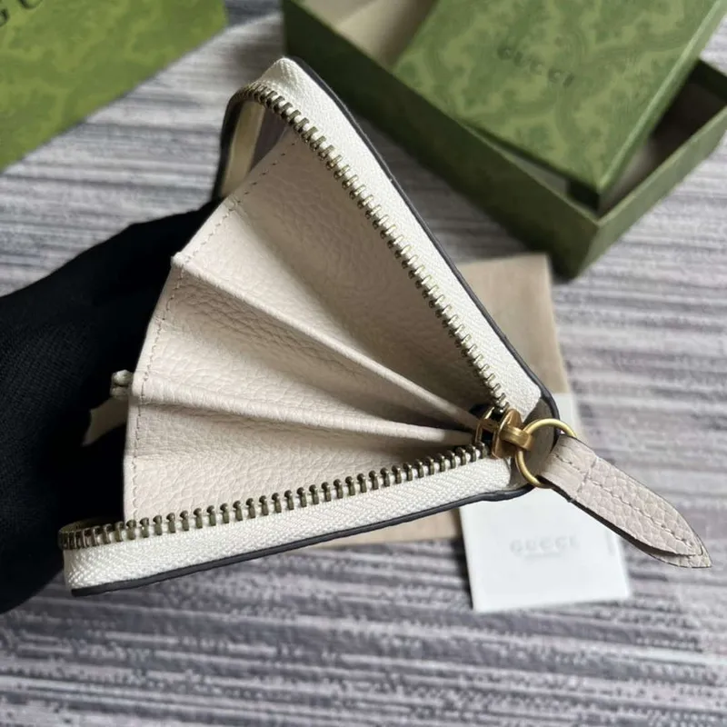 Gucci 750458 zipová peněženka s propletenou G pythonovou mašlí bílá