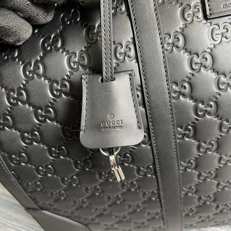 Gucci 406380 GG Embossed Duffle Bag Černá