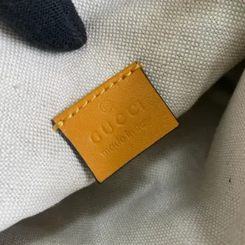 Gucci 658582 GG embosovaná taška přes pás Žlutá GG embosovaná kůže
