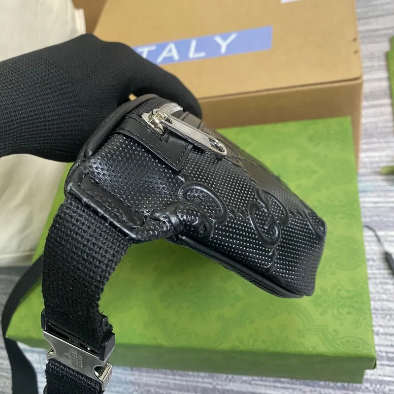 Gucci 658582 GG embosovaná taška přes pás Černá GG embosovaná kůže