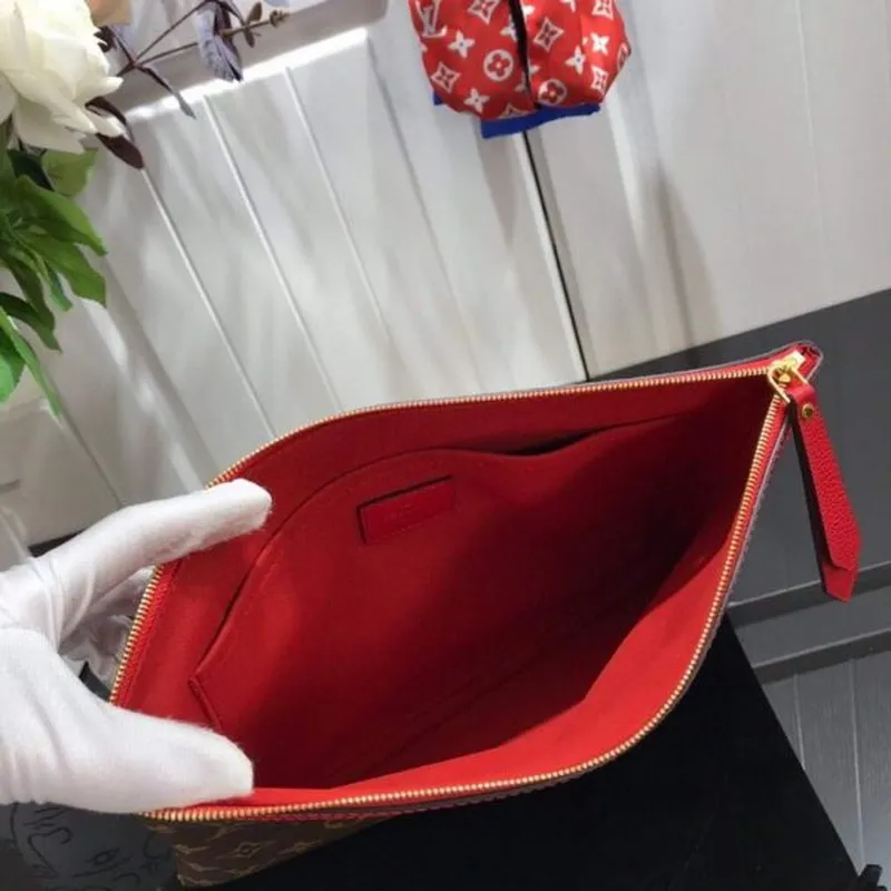 LV M64591 Louis Vuitton Denní Pouch Monogram Plátno Taška M62942 Červená