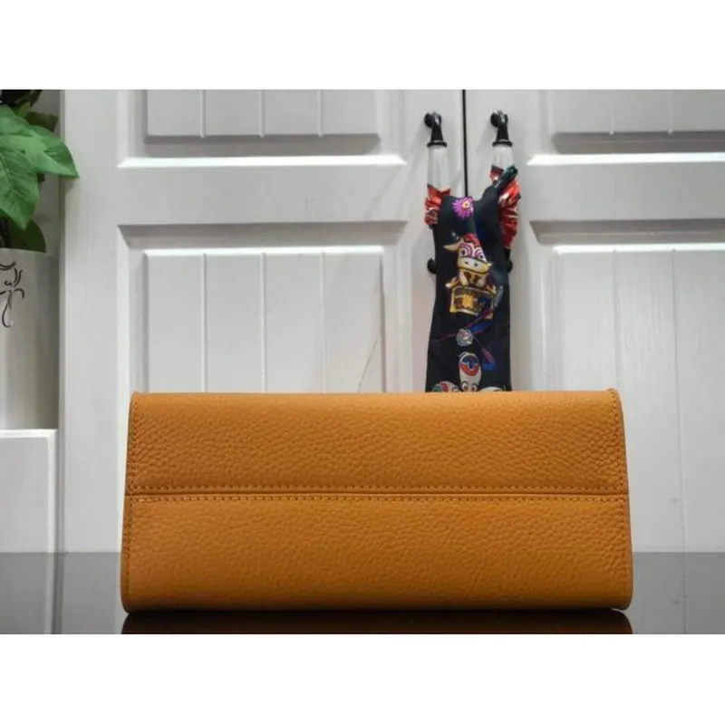 LV M57136 Louis Vuitton Twist jedna rukojeť PM M57093 Taurillon kůže šafrán