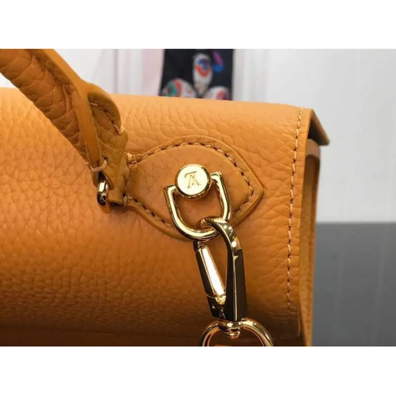 LV M57136 Louis Vuitton Twist jedna rukojeť PM M57093 Taurillon kůže šafrán