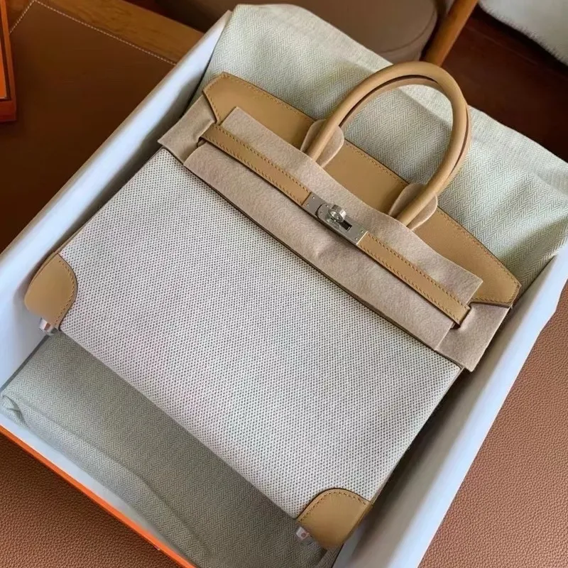 Hermes Birkin 25 Ručně vyráběná taška z plátna a kůže Biscuit Swift