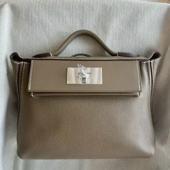 Hermes 24/24 Mini 21 Ručně vyráběná taška v taupe Evercolor kůži