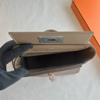 Hermes 24/24 Mini 21 Ručně vyráběná taška v taupe Evercolor kůži