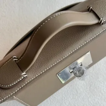 Hermes 24/24 Mini 21 Ručně vyráběná taška v taupe Evercolor kůži