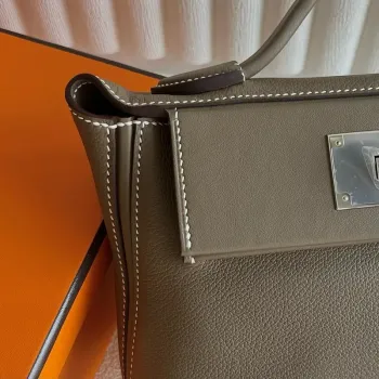 Hermes 24/24 Mini 21 Ručně vyráběná taška v taupe Evercolor kůži