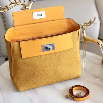 Hermes 24/24 29 Taška v curry kůži Clemence