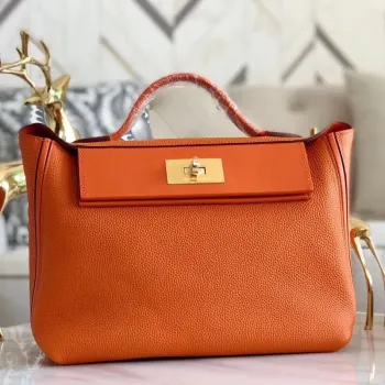 Hermes 24/24 29 Taška v oranžové kůži Clemence