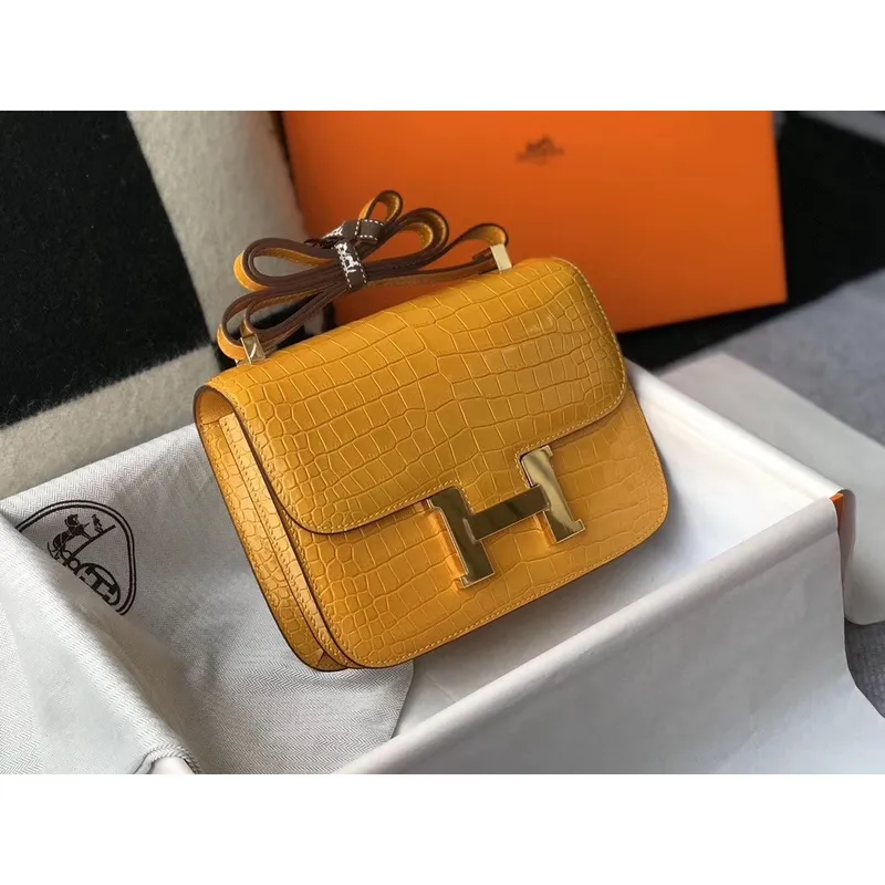 Kabelka Hermes Constance 24cm v žluté embosované krokodýlí kůži