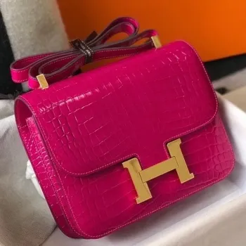 Taška Hermes Constance 24cm v růžové červené barvě s embosovaným krokodýlem