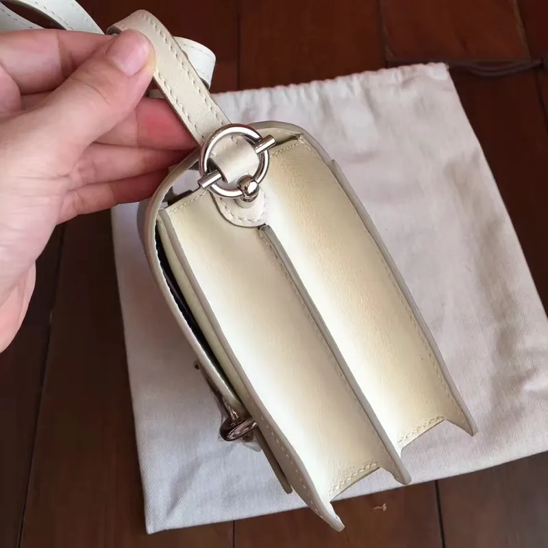 Hermes Mini Sac Roulis taška v krémové kůži Swift