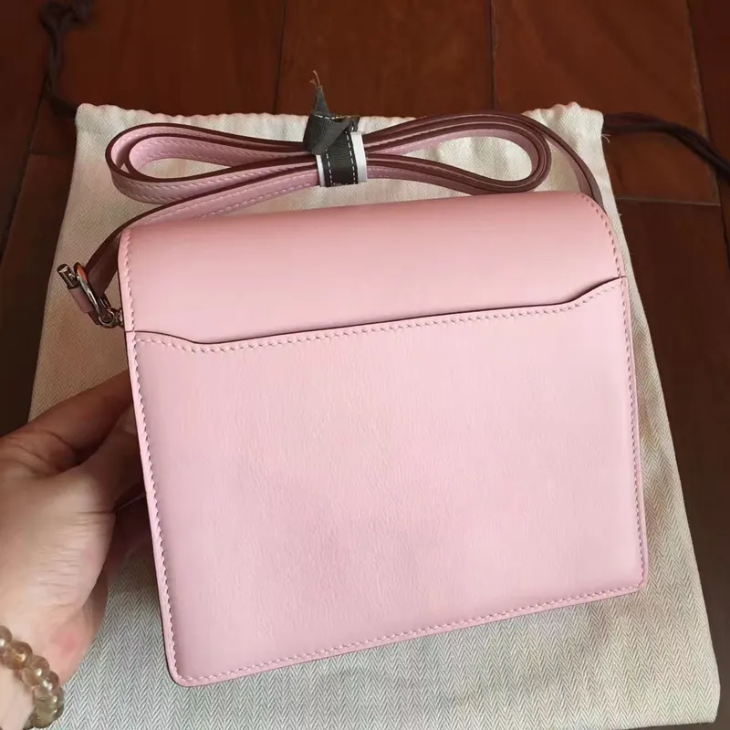 Hermes Mini Sac Roulis Taška v růžové dragee kůži Swift
