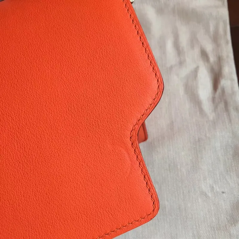 Hermes Mini Sac Roulis Taška v oranžové kůži Swift