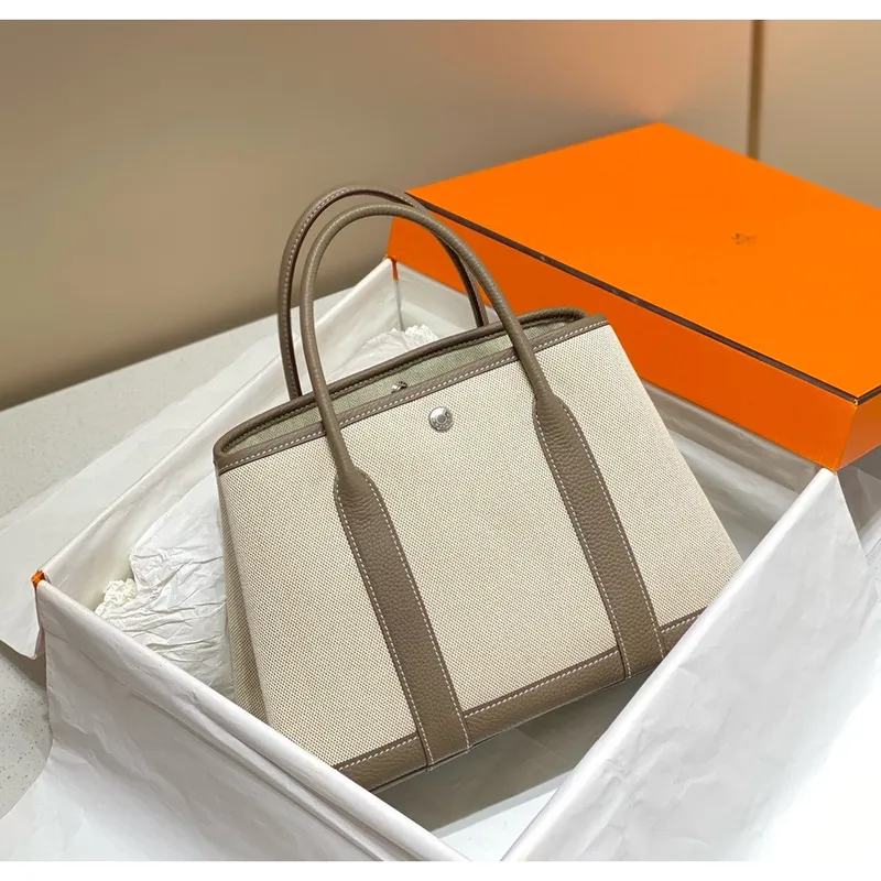 Hermès Garden Party 30cm taška v plátně a taupe kůži