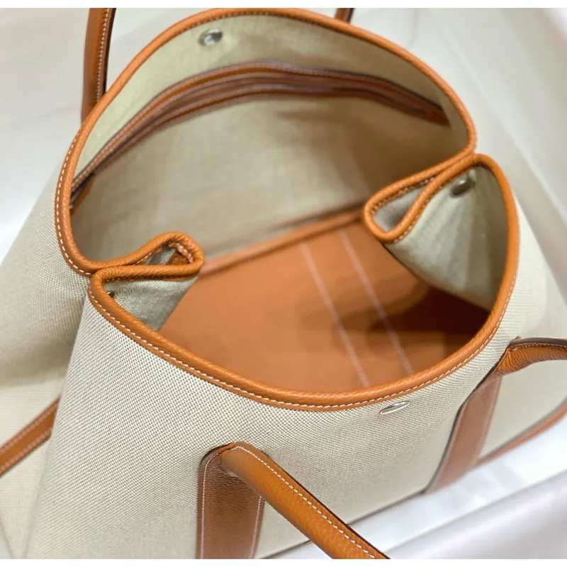 Hermes Garden Party 36cm Taška v plátně a zlaté kůže