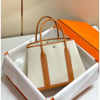 Hermes Garden Party 36cm Taška v plátně a zlaté kůže