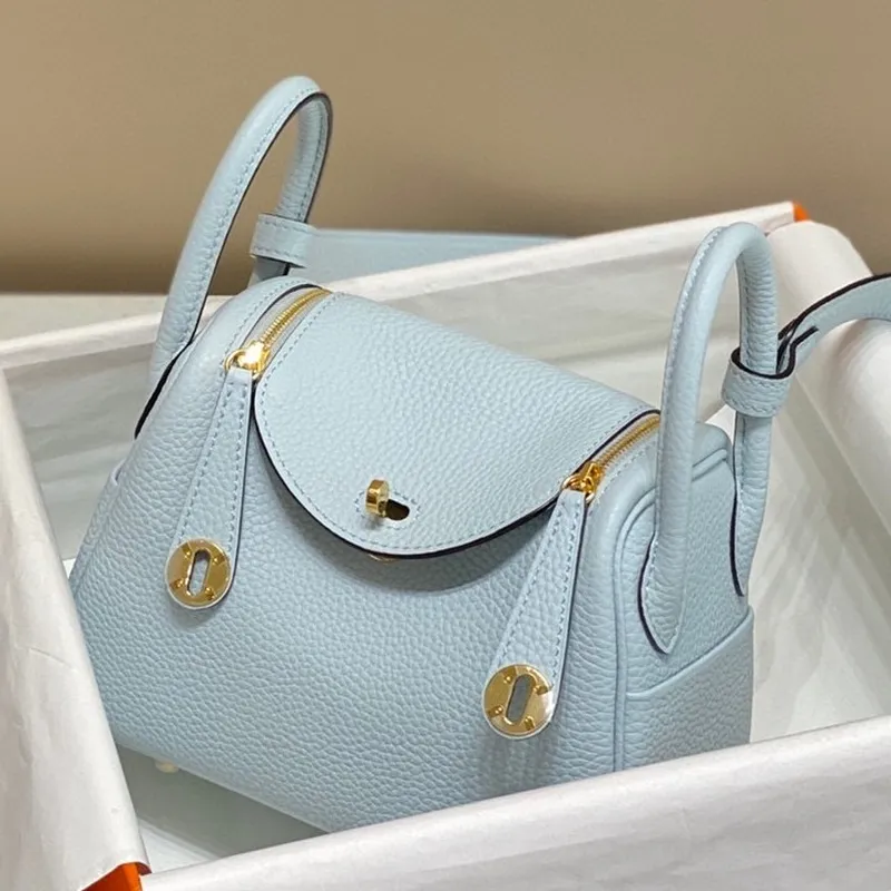 Hermes Lindy Mini Taška v modré Brume kůži Clemence GHW