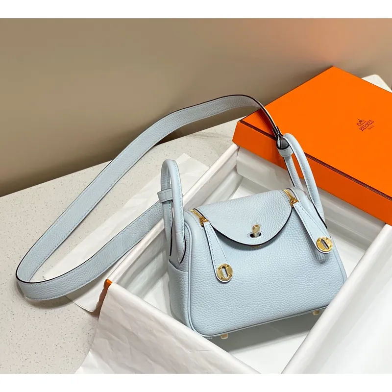 Hermes Lindy Mini Taška v modré Brume kůži Clemence GHW