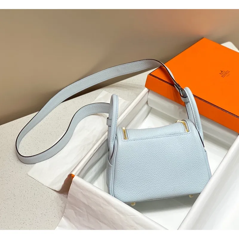 Hermes Lindy Mini Taška v modré Brume kůži Clemence GHW