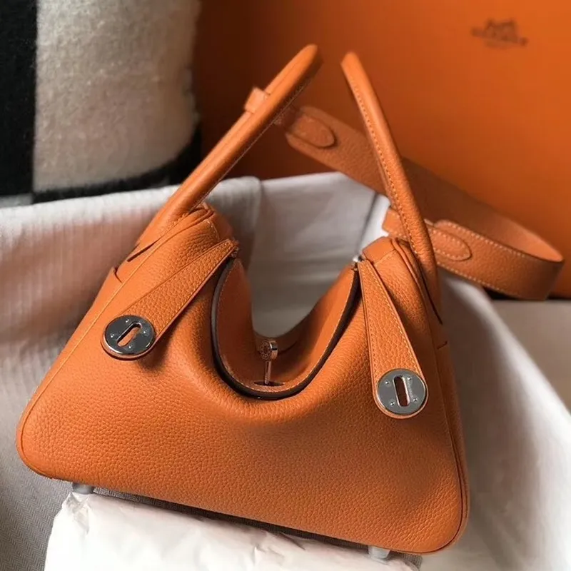 Hermes Lindy 26cm Taška v oranžovém Clemence s PHW