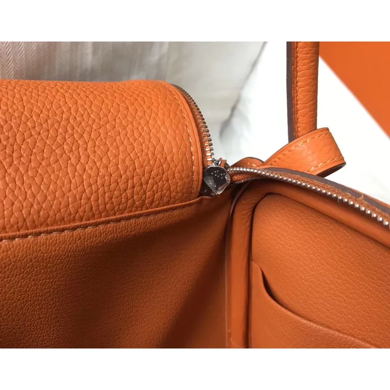 Hermes Lindy 26cm Taška v oranžovém Clemence s PHW