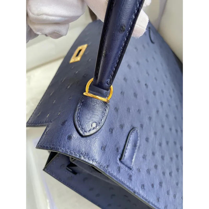 Kelly Sellier 25 Ručně vyráběná taška v modré iris pštrosí kůži