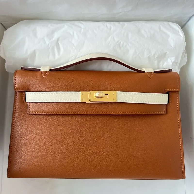 Hermes HSS Kelly Pochette Bicolor Taška ve zlaté a krémové Swift telecí kůže