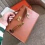 Hermes Gold Kelly Pochette Swift Ručně vyráběná taška