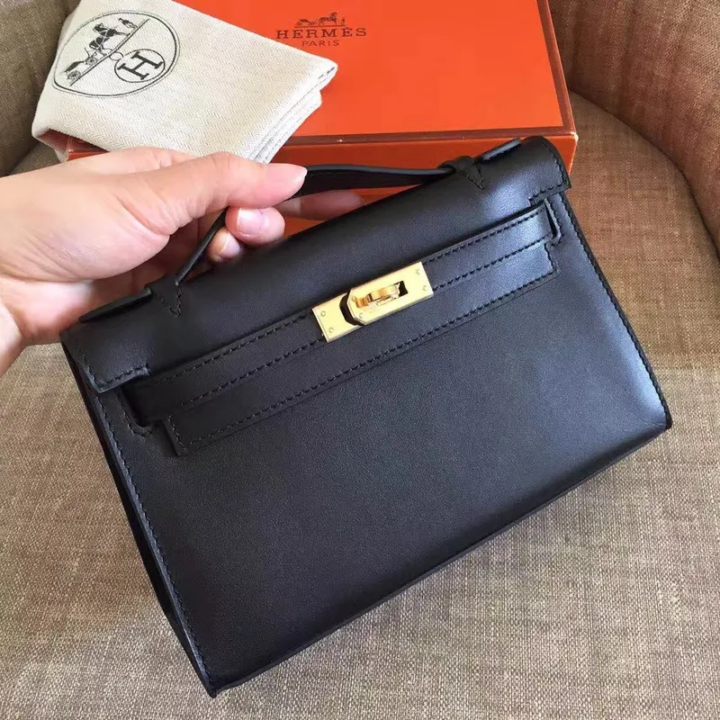 Hermès Černá Kelly Pochette Swift Ručně vyráběná taška
