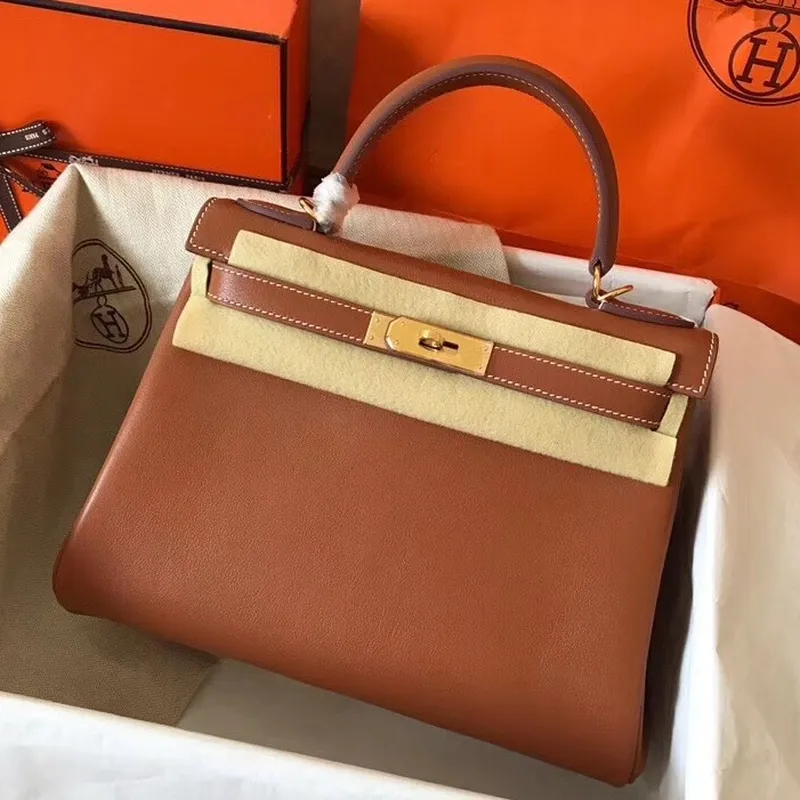 Hermès Gold Swift Kelly 28cm Ručně vyráběná taška