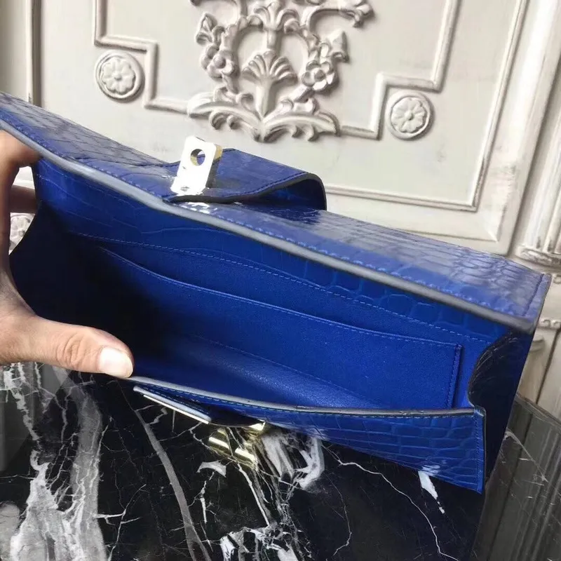 Hermes Medor Clutch Bag v modré krokodýlí kůži